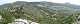  Dans la montée au Taoumé . A gauche le col de Baume Sourne avec dans le Prolongement la piste du col de Tubé accessible en VTT. En dessous le sentier du col de Baume Sourne vers  le Pas du Loup. Dans le Vallon en bas le Jardinet. (c) Christophe ANTOINE
900*273 pixels (39707 octets)(i1709)
