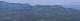  Vue depuis le Taoumé sur le massif de l'étoile au zoom.  Au fond a droite la St Victoire.  A sa gauche le mont Julien. (c) Christophe ANTOINE
882*238 pixels (14520 octets)(i1700)