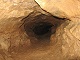    Grotte dans le vallon des Escaouprés au dessus de la source du chien.  (c) Christophe ANTOINE
500*375 pixels (30123 octets)(i3799)